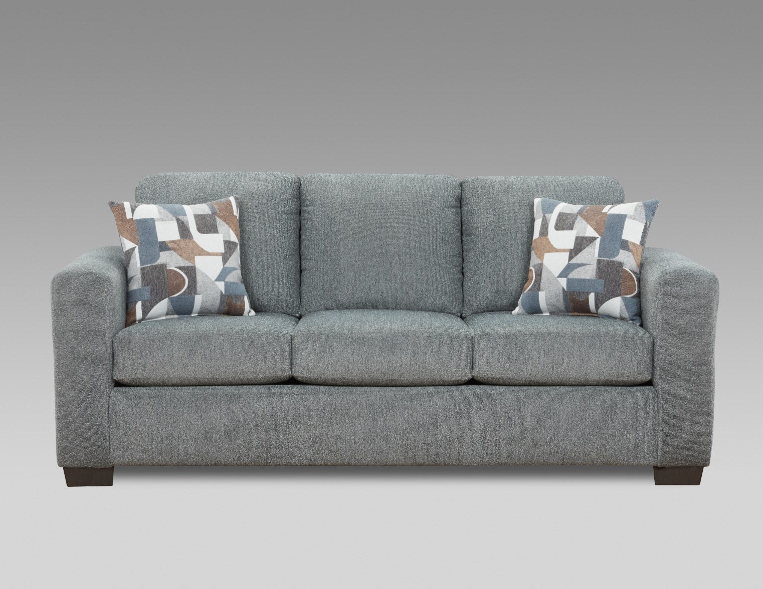 Full front view of the coordinating sofa, displaying the same style and fabric, suggesting a complete living room set.