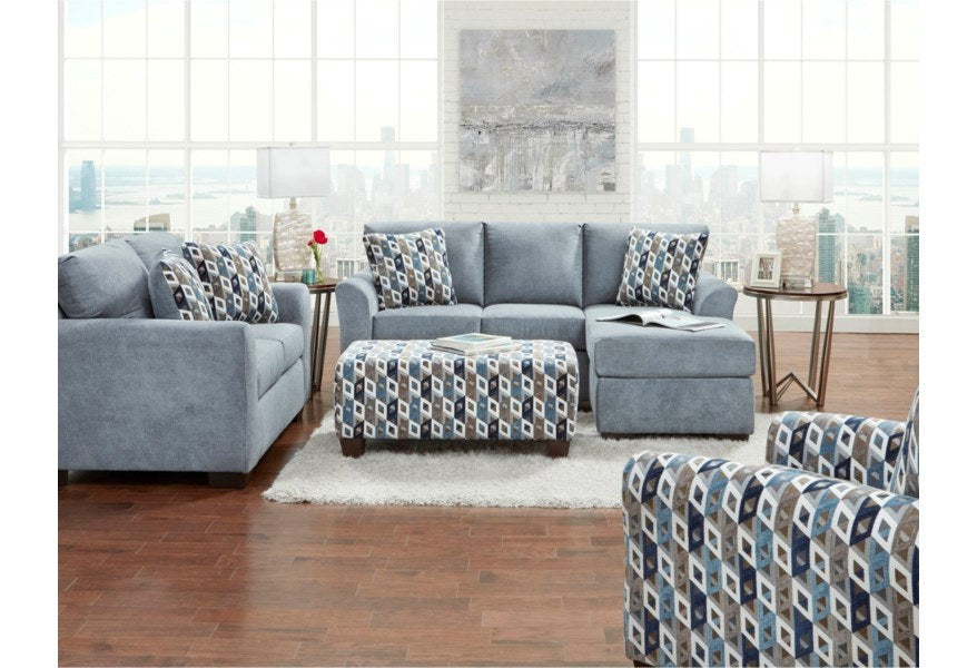 Frontal view highlighting the main sectional sofa and patterned ottoman.