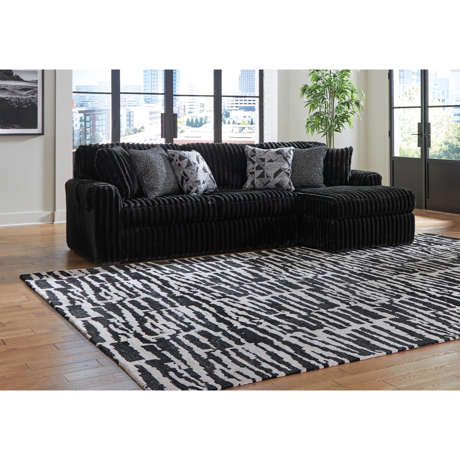 Ashley Midnight-Madness 2-Piece Sectional - Onyx (room view, left angle)