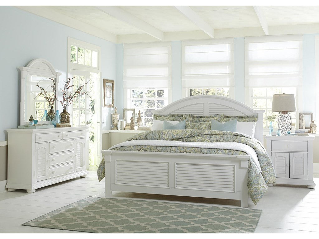 Full front view of the white double dresser, highlighting its louvered side cabinets and clean design.