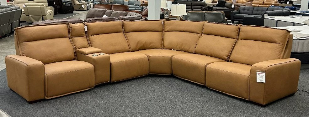 Full, wide-angle view of the modular power reclining sectional sofa in a warm tan/camel leather finish, showcasing its power recline functionality and integrated console.