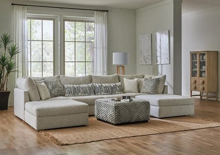 Behold 2880 Modular Light Gray Fabric Console - Lifestyle shot featuring a similar Behold sectional in a bright living space, highlighting the modern aesthetic and comfortable design, without explicitly showing the console piece.
