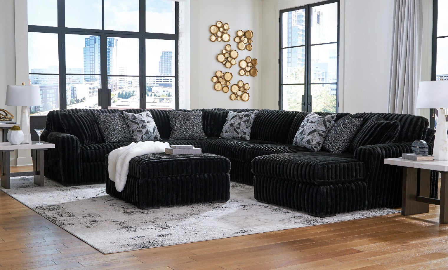 Ashley Furniture Ashley Midnight Madness 3-Piece Sectional with Ottoman - Black Ribbed Chenille