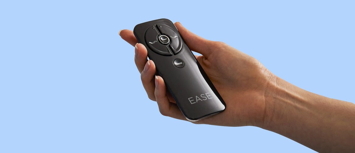 Sealy Ease 4.0 wireless remote shown in hand