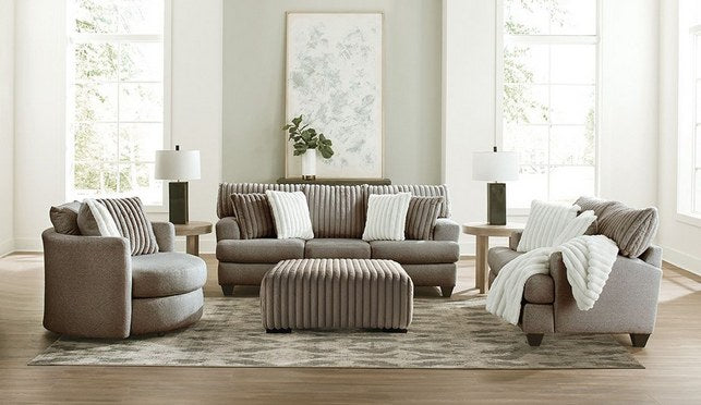 A clear, front-facing full view of the Albany OTTO ottoman, prominently showcasing its distinctive ribbed channel tufting and low-profile feet.