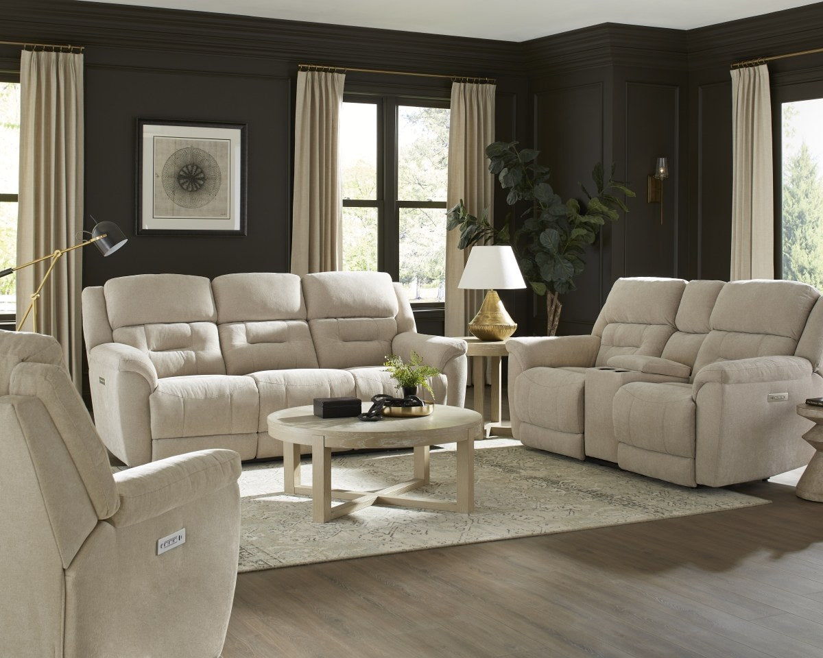 Full view of the HomStyle Power Reclining Sofa set in a sophisticated living room, showcasing its stone-colored fabric and modern design.