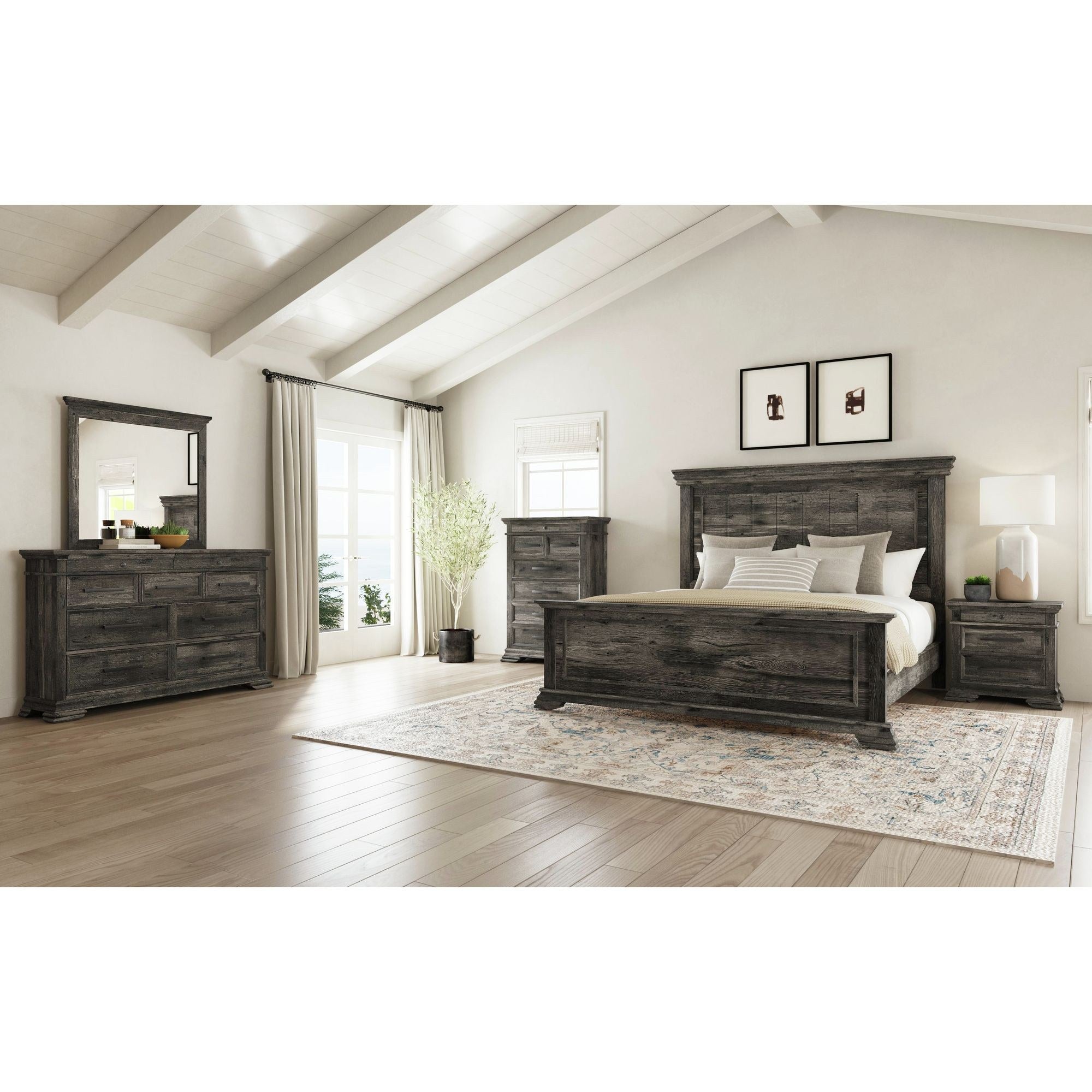 Comprehensive view of the complete bedroom set, showcasing the bed, dresser, mirror, chest, and nightstand in a bright, rustic-styled room.