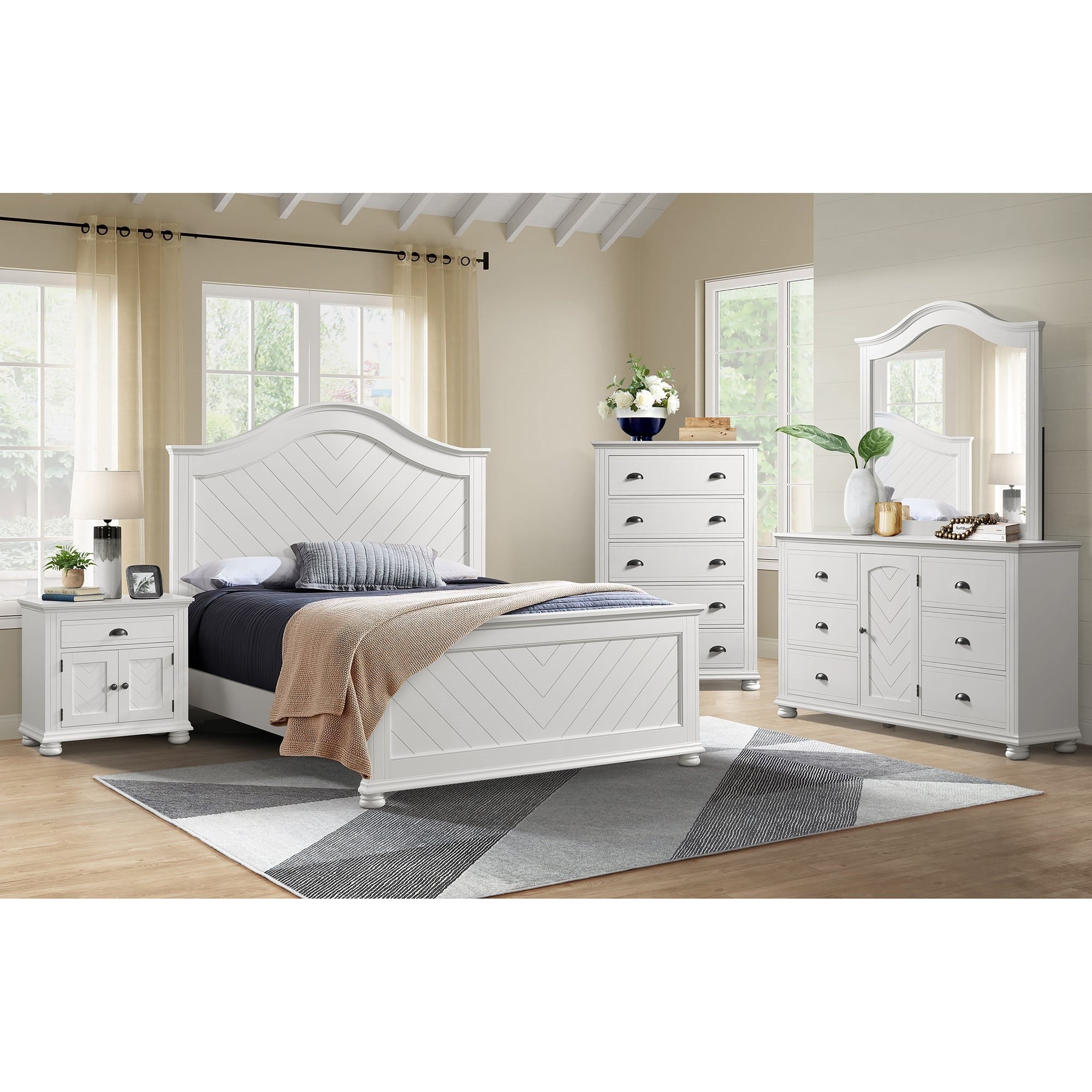 Lifestyle shot of a white bedroom set, highlighting the nightstand with a herringbone pattern, positioned beside the bed.